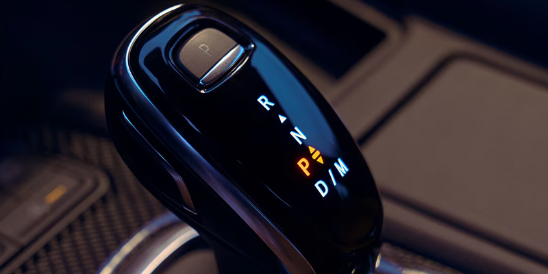 Close-up shot of Cadillac CT5 electronic gear shift selector.