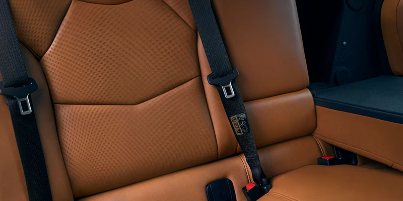 Tan leather rear passenger seats in a Cadillac CT5.